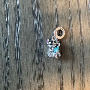 Stitch and castle dangling charm